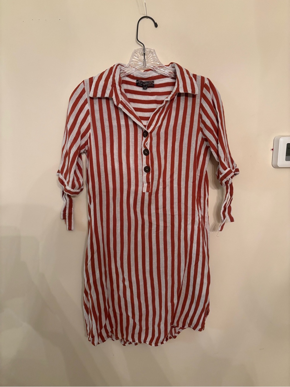Orange and white women’s summer top. Great for the beach!